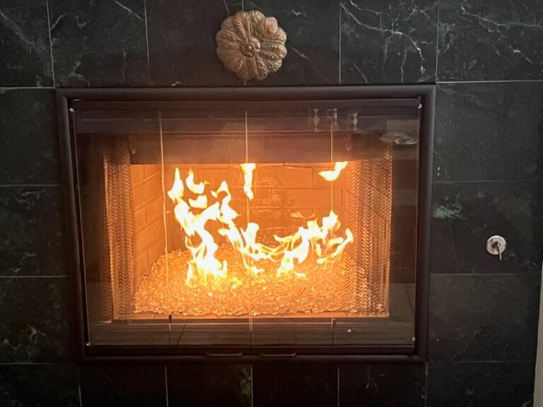 Projects gas fireplace with custom glass door installation in Frisco Texas