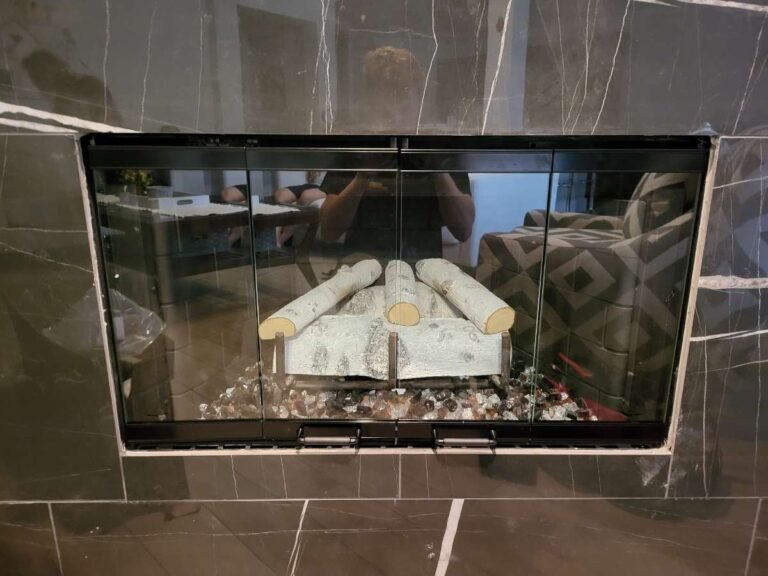 Projects birch gas log set with multi colored fire glass bed in Dallas Texas