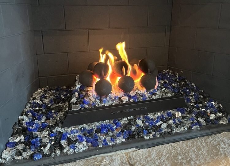 Projects vent free unit w geospheres and fireglass installation in North Lake Texas