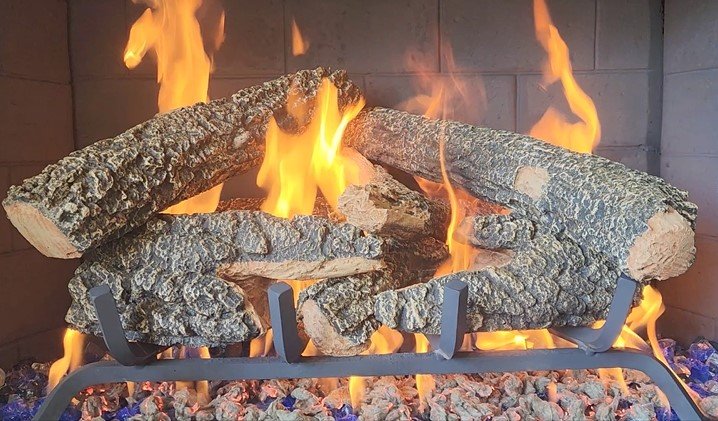 Projects Outdoor patio gas fireplace service and gas log replacement with fire glass in Frisco Texas